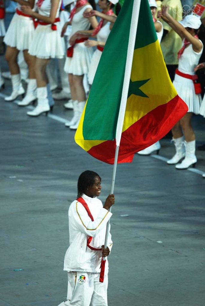 Beijing - 8 août 2008 : la délégation sénégalaise est emmenée par sa porte-drapeau, la taekwondoïste poids plume Bineta Diedhiou, au cours du défilé des nations au Stade National, lors de la Cérémonie d'ouverture des Jeux Olympiques de Beijing 2008. PHOTO BY VLADIMIR RYS/BONGARTS/GETTY IMAGES